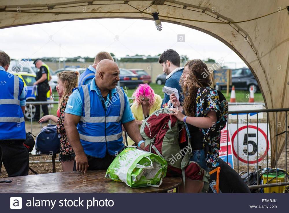 security-checking-bags-at-the-brownstock-festival-in-essex-E7MBJK.jpg