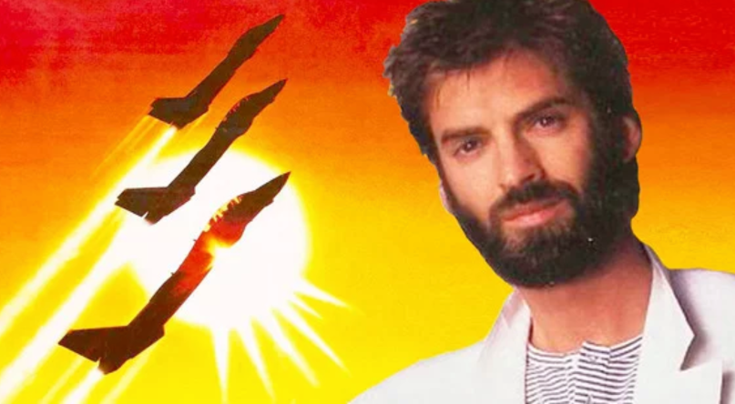 kenny-loggins-danger-zone.png.8294c198a48c2accd69bc04855eee2df.png